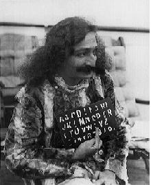Meher Baba with His Alphabet Board